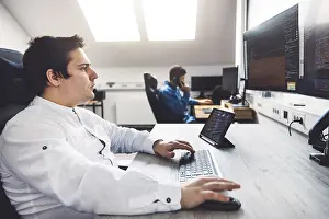 Computer Specialist Prints: IT Programmer Working on Desktop Computer