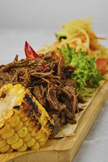 Deserted Grill Scene Prints: Pulled beef served with grilled corn and pickled cabbage
