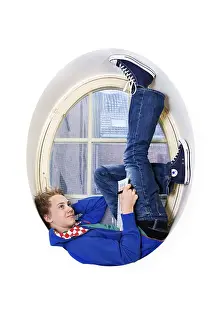 Educational Institution Interior Prints: Pupil resting in window at school - notepad