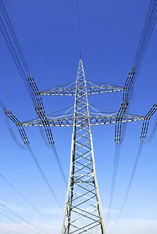 Deserted Road Traffic Prints: Pylon in front of deep blue sky and some clouds