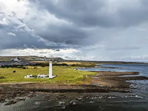 Scottish Deserted Landscapes Prints: Rain Clouds over Barns Ness Lighthouse from a drone
