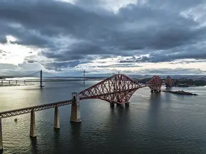 Forth Bridge Scotland Prints: Rain clouds over Forth Bridge from a drone