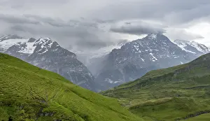Cloudy Mountain Peak Prints: Rain clouds pass through the mountains