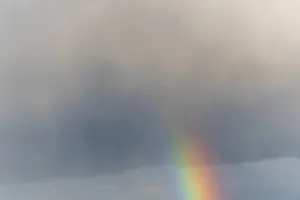 Springtime Alsace France Prints: Rainbow appears in rain clouds in spring
