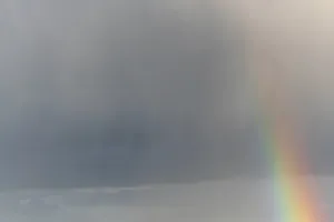 Springtime Alsace France Prints: Rainbow appears in rain clouds in spring