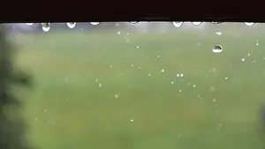 Central Europe Precipitation Prints: Raindrops hanging on the window frame