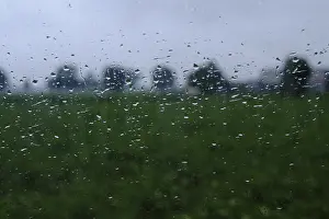 Rainy Day Window View Prints: Raindrops streaming down a window