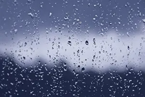 Blue Gradient Background Prints: Raindrops on the window pane. Blue gradient on blurry background