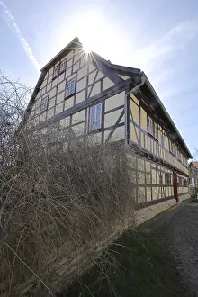 Timber Framed Houses Germany Prints: Rectory of St. Stephen in backlight
