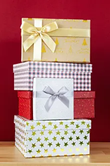 Plain Red Background Image Prints: A red background with batch of Christmas gift boxes