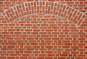 Red Brick Wall Prints: Red brick wall with an arch