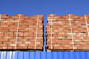 Industrial Building Materials Prints: Red bricks stacked into cubes. Warehouse bricks