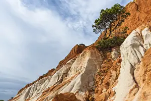 Rock Formations Europe Prints: Red cliffs on sandy beach in Algrave