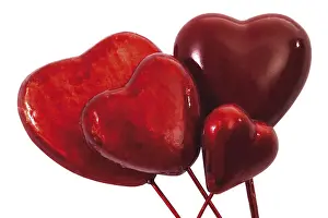 Studio Shot Of Hearts Prints: Four red hearts