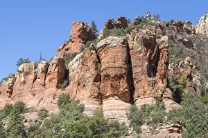 Red Rock Formations Prints: Red rock formations with a face