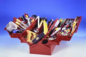 German Studio Shot Prints: A red toolbox with tools, hammer