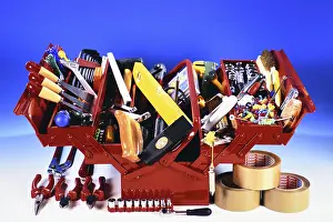 German Studio Shot Prints: A red toolbox with tools, hammer