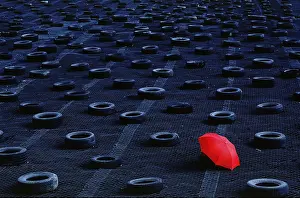 Abstract Still Life Photography Prints: Red umbrella on garbage dump