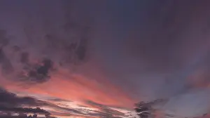 Overcast Cloudy Skies Europe Prints: Reddish clouds in the evening sky