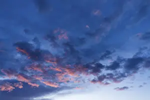 Gloomy Evening Atmosphere Prints: Reddish clouds in the evening sky