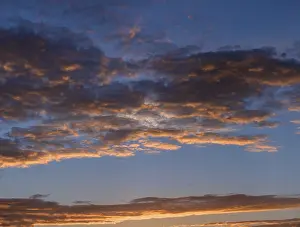 Southern Germany Cloudy Skies Prints: Reddish clouds in the evening sky