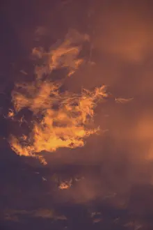 Cloudy Sky Travel Photography Prints: Reddish clouds in the evening sky