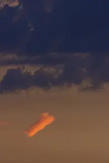 German Rain Clouds Prints: Reddish small cloud in evening light
