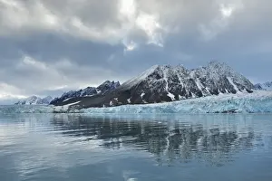 Cloudy Coastal Scene Prints: Reflection, mountains and Monacobreen glacier