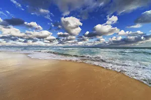 Waterfront Landscape Photo Prints: Reflection of the sky in the sand beach