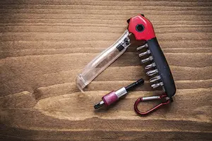 Wooden Board Texture Pattern Prints: Replaceable turnscrew bits in toolbox on wooden board construction concept