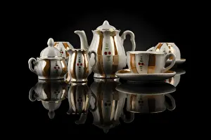 Plain Black Background Photo Prints: Retro tea set with reflection on black background