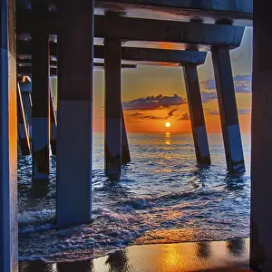 USA Coastal Landscapes Prints: The rising sun peeks through clouds