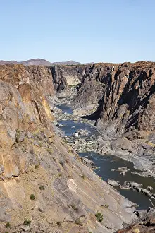 Deserted River Waterfront Prints: River bed and dump on the Orange River