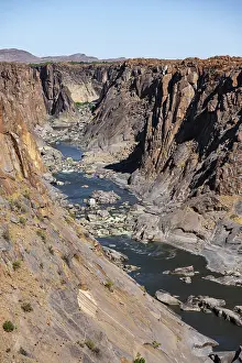 Deserted River Course View Prints: River bed and dump on the Orange River