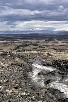 Vatnajokull National Park Images Prints: River flows through volcanic landscape