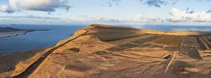 Steep Coast Canary Islands Prints: Road on cliffs in evening light