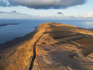 Evening Light On Coast Prints: Road on cliffs in evening light