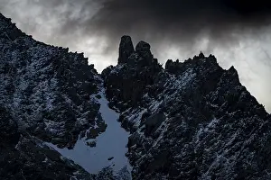 Dramatic Cloud Atmosphere Prints: Rock ridge with dramatic clouds