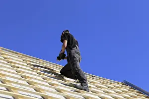 Roofer At Work Prints: Roofer or carpenter at work