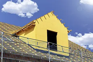 Construction Site Worker Prints: Roofer working on a new dormer window
