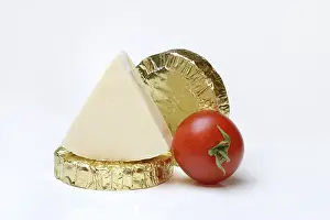 Cheese Nutrition Facts Prints: Round and triangular processed cheese with tomato