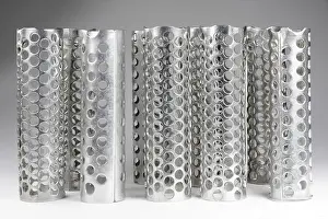 Beauty Product Photography Prints: Rows of metallic curlers