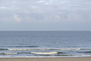 German Federal Republic Coastline Prints: Running out waves at the sandy beach
