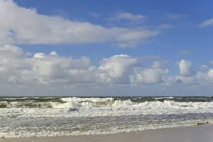 Cumulus Cloud Formation Prints: Running out waves on the sandy beach