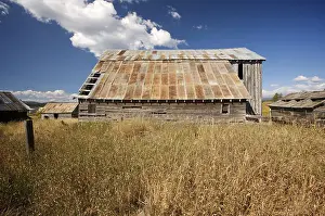 Deep Blue Sky Prints: Rustic barn scene with deep blue sky and clouds