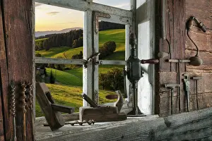 Black Forest Landscape Photography Prints: Rustic workshop with old tools and view out of the window into the landscape