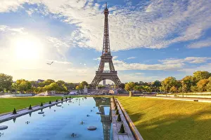Paris Evening Skyline Prints: Scenic Eiffel Tower view with sunset reflection