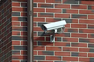 CCTV Camera Installation Prints: Security camera on the wall of the House