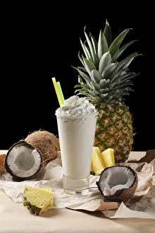 Pineapple Dessert Prints: Selective focus composition with coconut cocktail served with pineapple
