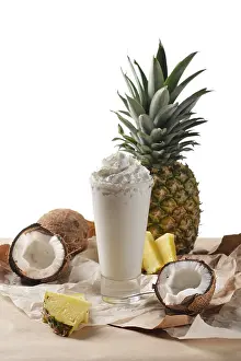Pineapple Dessert Prints: Selective focus composition with coconut cocktail served with pineapple